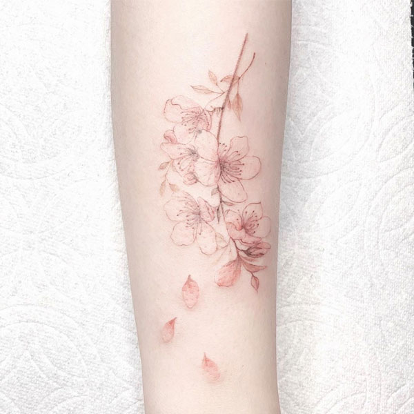 Tattoo hoa đào cánh tay đẹp cho nữ