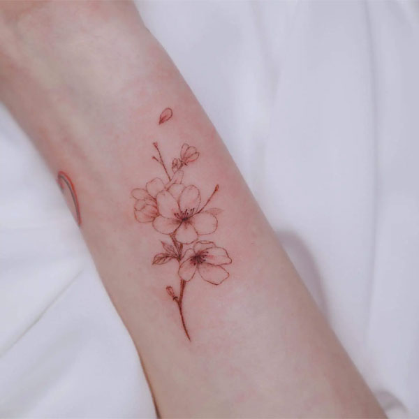 Tattoo hoa đào cổ tay