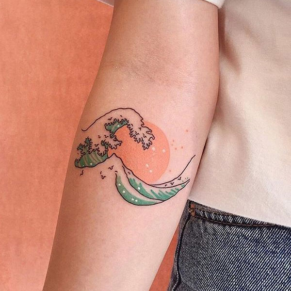 Tattoo mệnh mộc sóng biển nữ đẹp