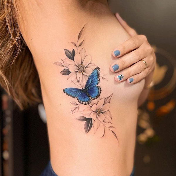 Tattoo mệnh kim bươm bướm ở ngực