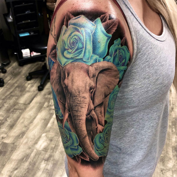 Tattoo mệnh kim voi ở bắp tay