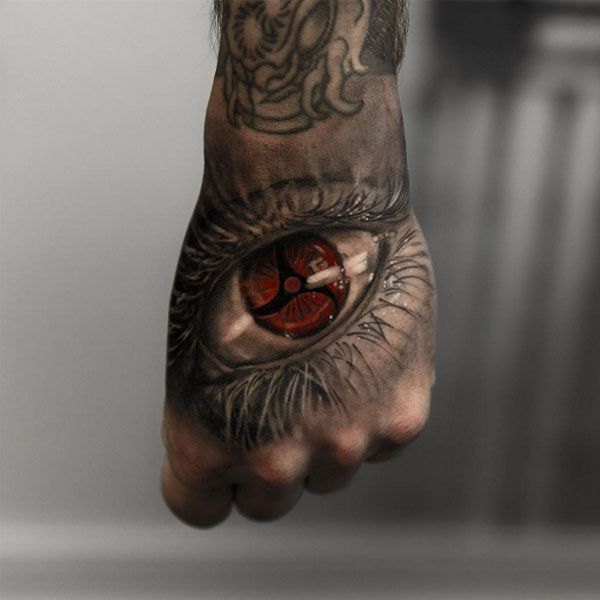 Tattoo itachi sharingan ở tay