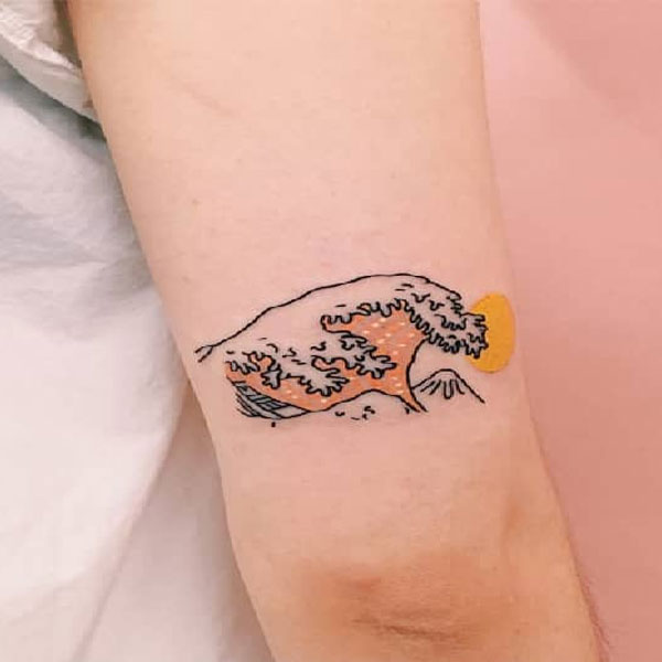 Tattoo sóng biến bắp tay siêu cute