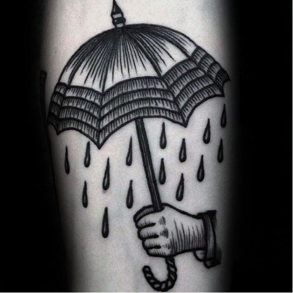 Hình xăm tay cầm chiếc ô