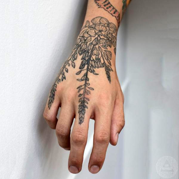 Ý nghĩa hình xăm hoa mẫu đơn trong nghệ thuật tatoo mini là gì?